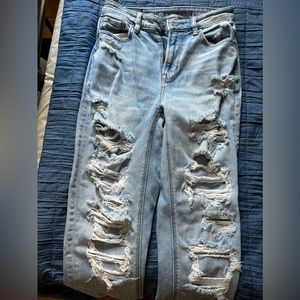 High rise- minimal stretch more mom Jean fit